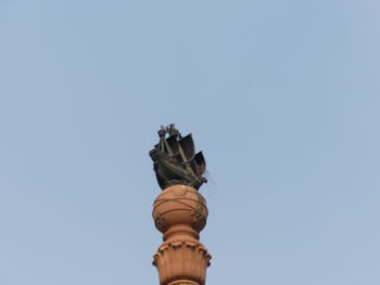 Low angle view of statue against clear sky