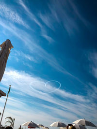 Low angle view of buildings against blue sky