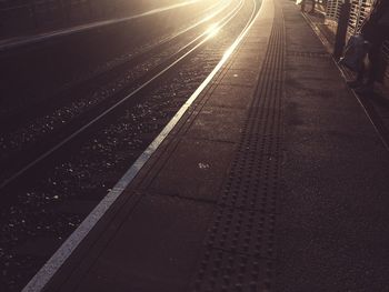 Low section of train at railroad station at night