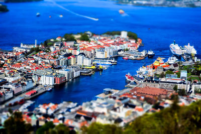 High angle view of townscape by sea