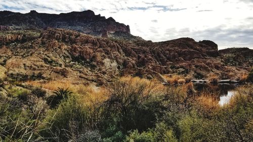 Scenic view of rocky mountains against sky