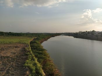Scenic view of river against sky