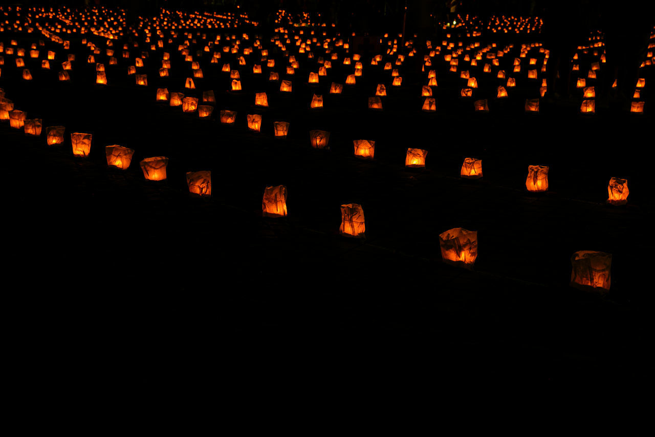 font, darkness, large group of objects, light, illuminated, in a row, no people, lighting equipment, night, lighting, tradition, orange color, lantern