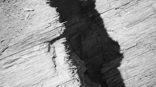 Close-up of shadow on stone wall