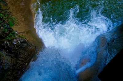 Stream flowing through rocks