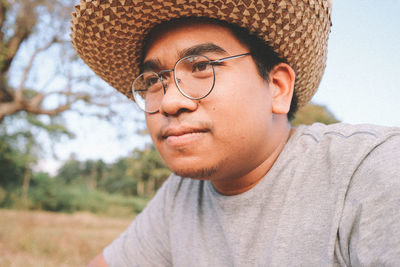 Portrait of young man wearing hat