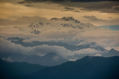 Scenic view of mountains against sky during sunset