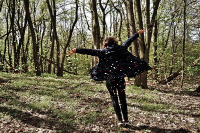 People walking on grassy field