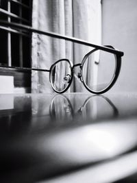 Close-up of eyeglasses on table
