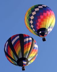 Low angle view of hot air balloon against clear sky