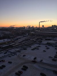 Smoke stack emitting pollution in sky