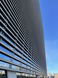 Low angle view of modern building against sky
