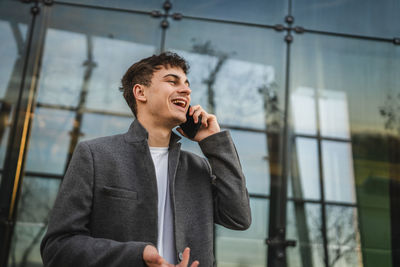 Young man using mobile phone