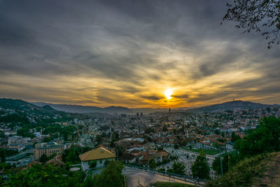 High angle view of townscape against sky during sunset