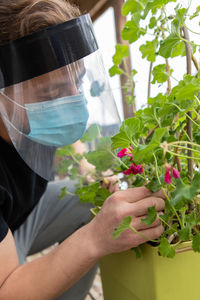 Close-up of man holding flowers