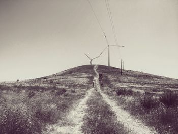 Empty road leading towards mountains