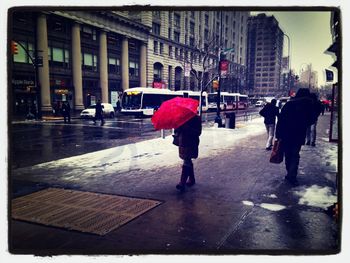 Woman walking on city street