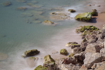 High angle view of rocks on beach