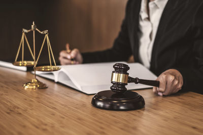 Close-up of a woman holding a table