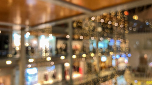 Defocused image of illuminated lights at night