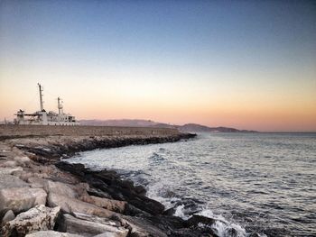 Scenic view of sea at sunset