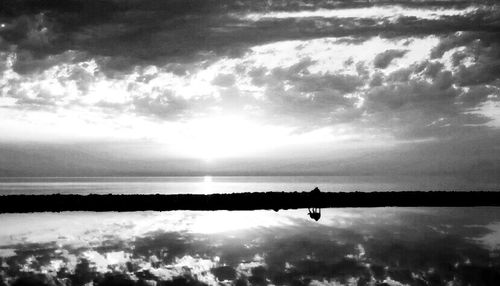 Sun shining over sea