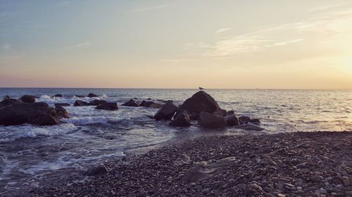 Scenic view of sea against sky during sunset