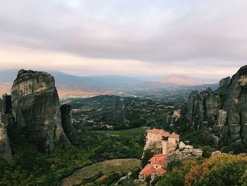 Panoramic view of landscape against cloudy sky