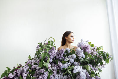 Portrait of woman with bouquet