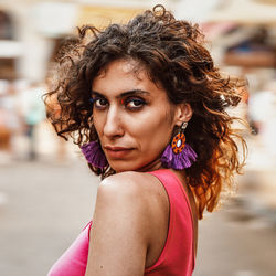 Portrait of young woman looking away