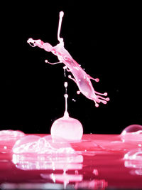 Close-up of water over black background