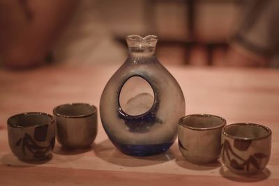 Close-up of glasses on table
