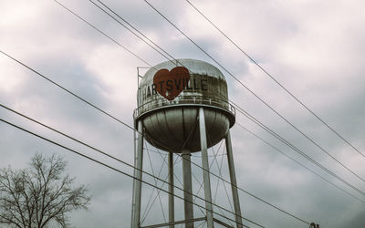 Low angle view of water tower against sky