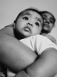 Low angle view of mother and daughter