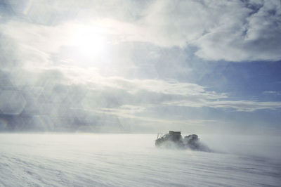 Vehicle in snowy landscape