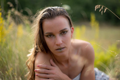 Portrait of beautiful young woman outdoors