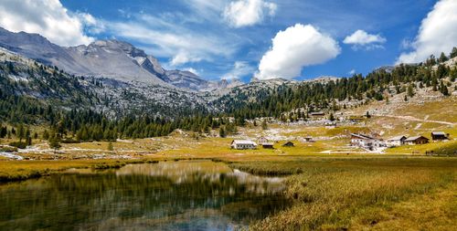 Panoramic view of lake and mountains against sky