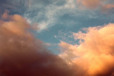 Low angle view of cloudy sky during sunset