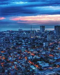 High angle view of city at sunset