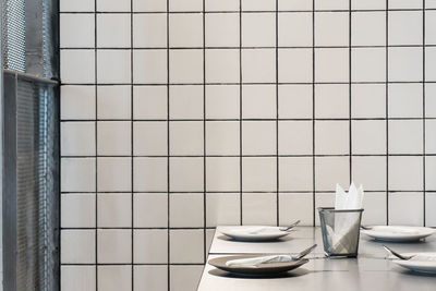 Close-up of eating utensils on table