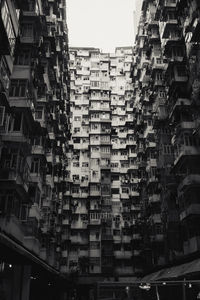 Full frame shot of buildings in city at night