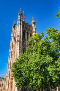 Low angle view of historical building against blue sky