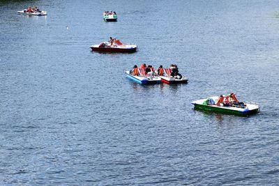 People on boat sailing in sea