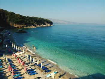 High angle view of swimming pool by sea against sky