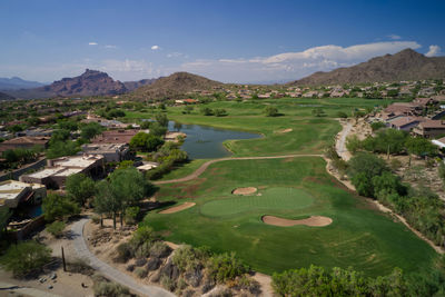 High angle view of landscape and mountains against sky