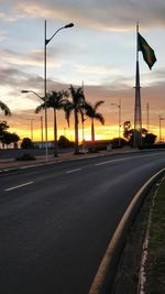 View of street against sky during sunset