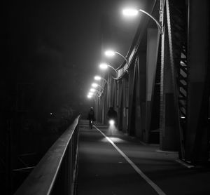 Illuminated street lights at night