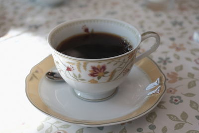 Close-up of tea cup on table