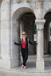 Full length of young woman standing at fisherman bastion