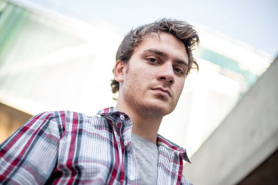 Portrait of young man looking away